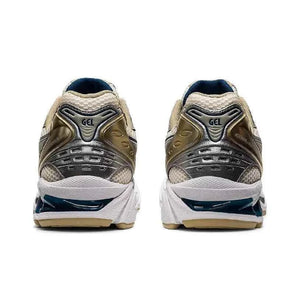 Asics Gel Kayano 14 حذاء ذهبي فضي.