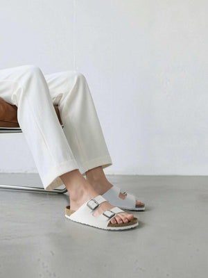 BIRKENSTOCK Arizona double-buckle slippers.