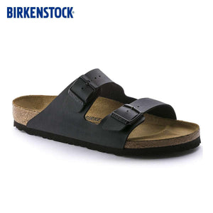 BIRKENSTOCK Arizona double-buckle slippers.