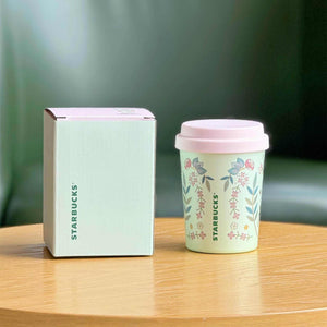 كوب Starbucks بنقشة Floral ولون أخضر ربيعي.