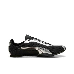 حذاء رياضي Puma بتصميم شبكي وتفاصيل فضية أنيقة.