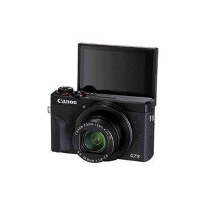 Front view of the black Canon PowerShot G7 X Mark III camera with its 180-degree tiltable touchscreen flipped up for vlogging and selfie mode.