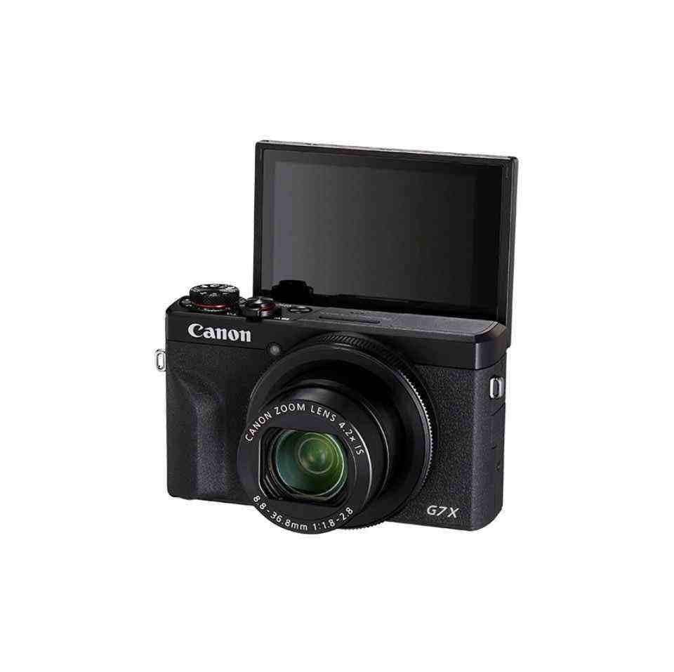 Front view of the black Canon PowerShot G7 X Mark III camera with its 180-degree tiltable touchscreen flipped up for vlogging and selfie mode.