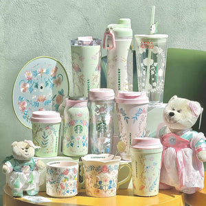 مجموعة Starbucks بنقوش الزهور ولون Pastel أخضر.